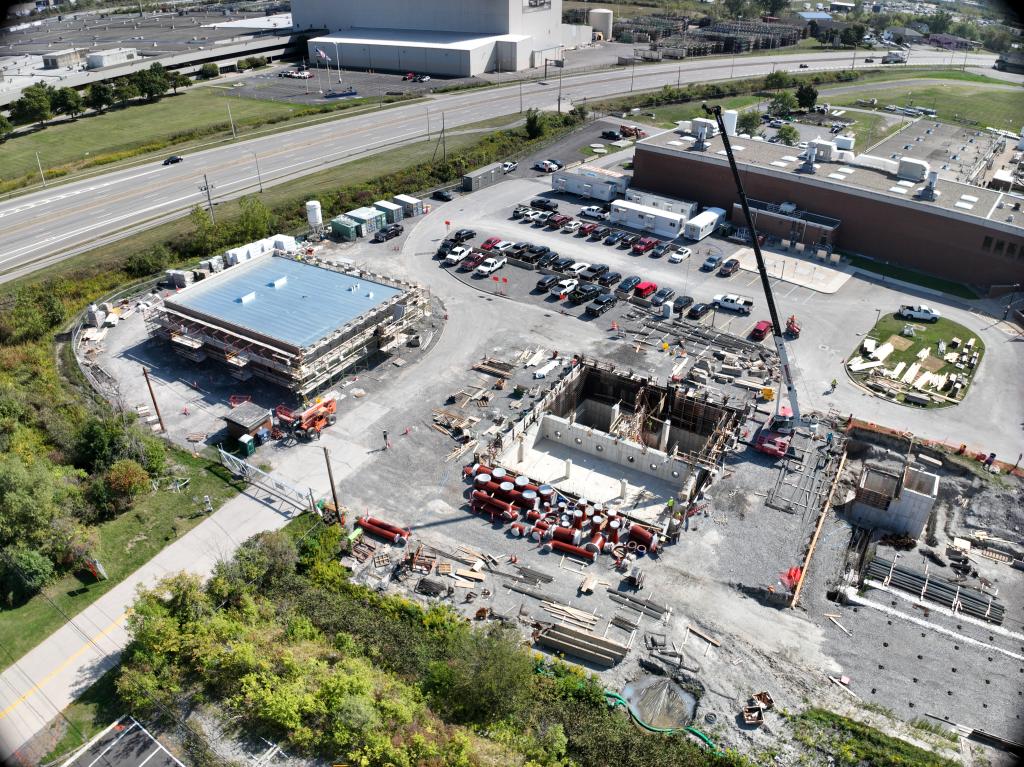 New electrical building (left) and effluent pumping station (center) facing souteast