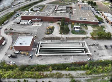 New effluent submersible pumping station and chlorine contact chamber (facing south)
