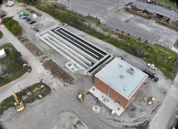 New effluent submersible pumping station and chlorine contact chamber (facing northwest)