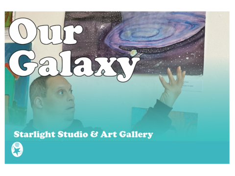 The image shows a Starlight Studio artist with his work which is a watercolor rendering titled "Our Galaxy"