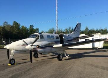 White airplane used to distribute oral rabies vaccination pellets