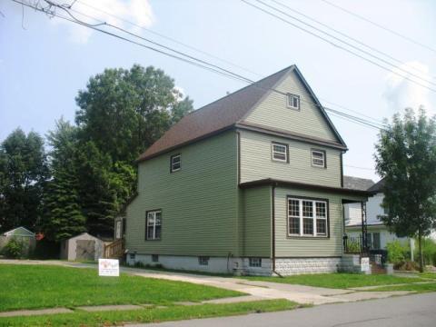 After: Roof and siding replacement. Home Rehabilitation Loan Program.