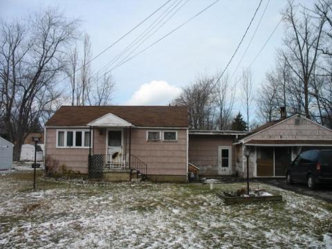 Before: Roof and siding replacement. Home Rehabilitation Loan Program
