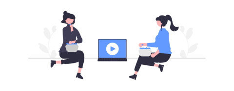 two people watching a movie on a laptop