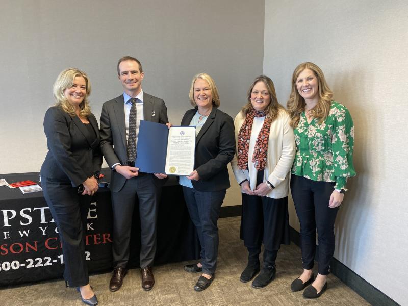 Erie County Deputy County Executive Lisa Chimera stands with four representatives from Upstate New York Poison Center to mark Poison Prevention Week.