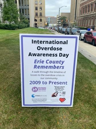 Poster sign for International Overdose Awareness Day, Erie County remembers