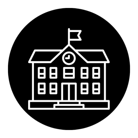 School building with clock and flag